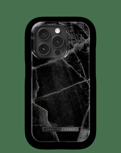 iPhone 14 Pro-deksel fra Ideal of Sweden med slankt svart marmordesign.